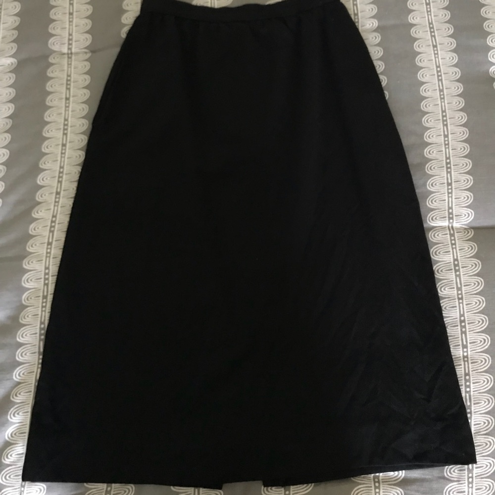 A vintage black high waisted skirt.